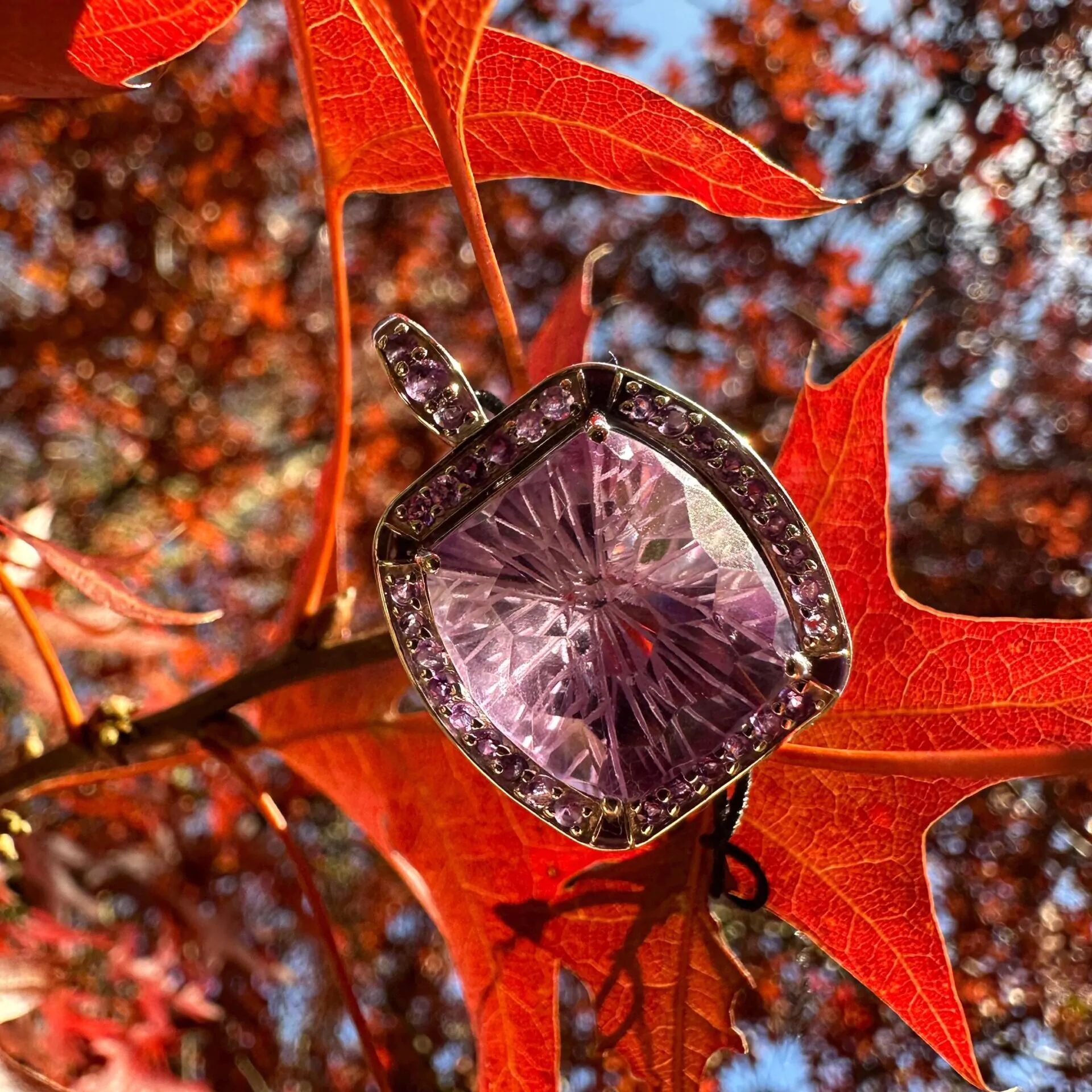 Elegant Sterling Silver Amethyst Pendant with Intricate Faceted Design and Halo of Purple Accents - Image 2