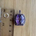 Elegant Sterling Silver Amethyst Pendant with Intricate Faceted Design and Halo of Purple Accents - Image 3