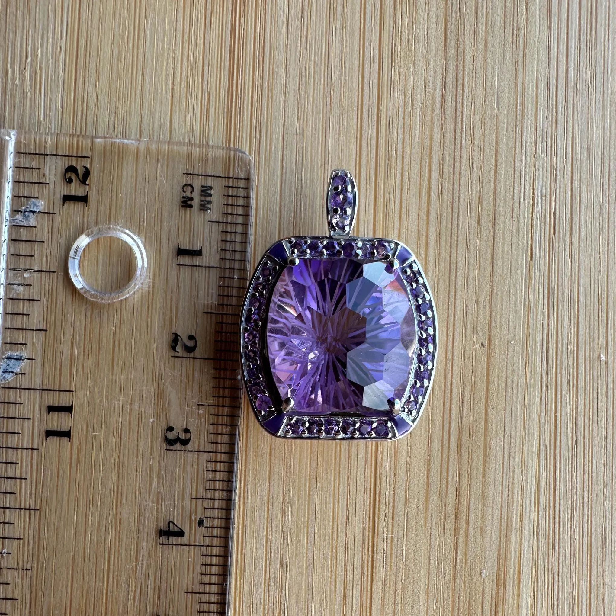 Elegant Sterling Silver Amethyst Pendant with Intricate Faceted Design and Halo of Purple Accents - Image 3